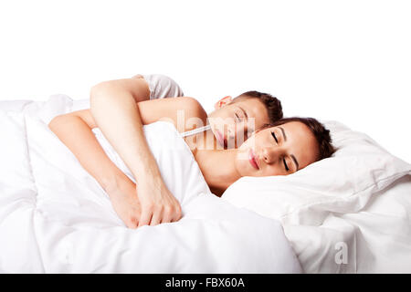 Couple happy asleep in bed Stock Photo