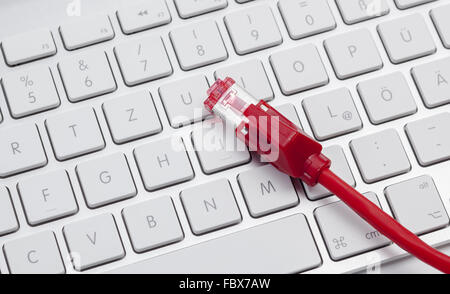 Keyboard and cable Stock Photo
