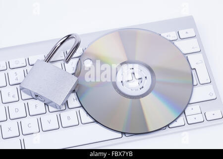 Open Padlock with CD and Keyboard Stock Photo