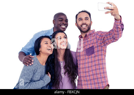 Multi-ethnic friends taking selfie Stock Photo