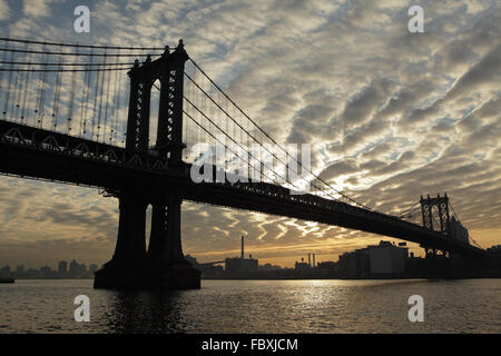 Industrial view of Manhattan Bridge waterfront sunrise New York City Stock Photo