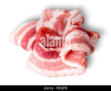 Chaotic stacked strips of bacon isolated on white background Stock Photo