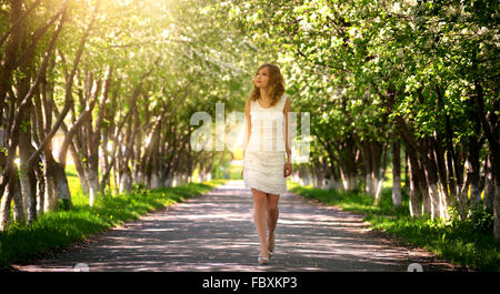 Girl walking in the park Stock Photo