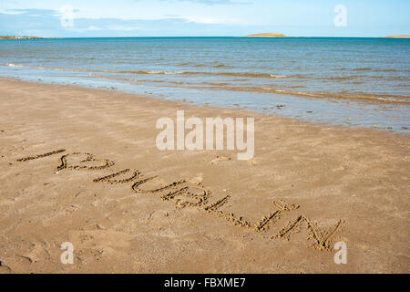 I love Dublin written on the sand in a beach Stock Photo