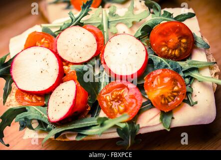 Fresh Vegetable and Ham Sandwich Closeup. Fresh Delicious Breakfast Sandwich. Stock Photo