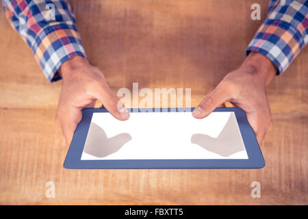 Cropped image of hands using tablet PC Stock Photo