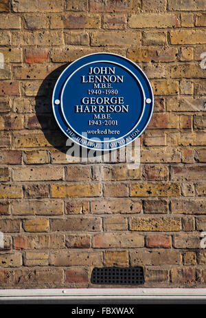 A blue plaque marking the former location of The Beatles’ defunct Apple Boutique shop on Baker Street in London. Stock Photo