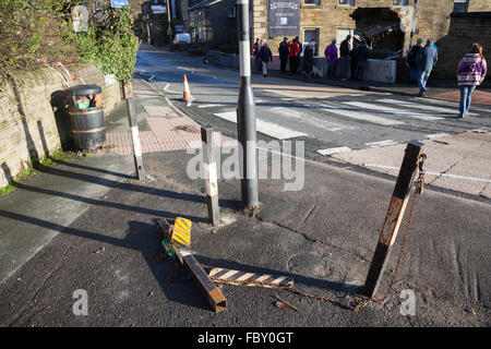 A view of Mill Hey in Haworth, England, after floods caused part of a pub wall to collapse. Stock Photo