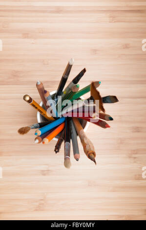 Selection of artists tools on a table Stock Photo - Alamy