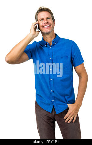 Cheerful man talking on mobile phone Stock Photo