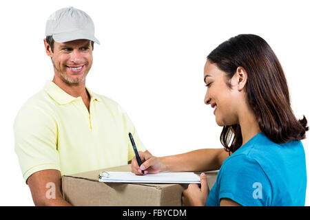 Cheerful delivery man with customer Stock Photo