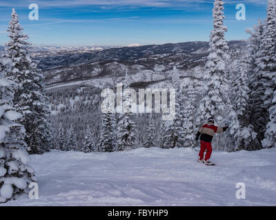 Skiers at the top of Storm Peak, Steamboat Ski Resort, Steamboat Springs, Colorado. Stock Photo