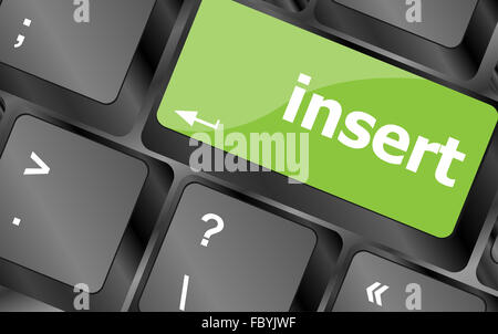 insert word on computer pc keyboard key Stock Photo