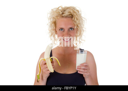Young woman with milk and bana Stock Photo