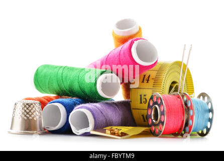 Composition with tailor needles and threads over white background Stock Photo
