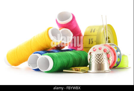 Composition with tailor needles and threads over white background Stock Photo