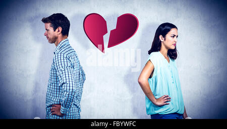 Composite image of frustrated couple ignoring each other Stock Photo