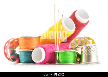 Tailor needles and threads over white background Stock Photo