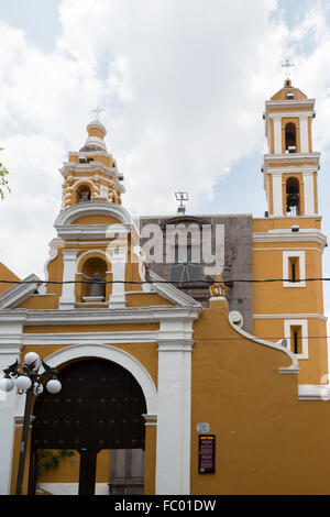Exterior of Templo del Ex-Hospital de San Juan de Dios, a 17th century Roman Catholic Church in Puebla Mexico. Stock Photo