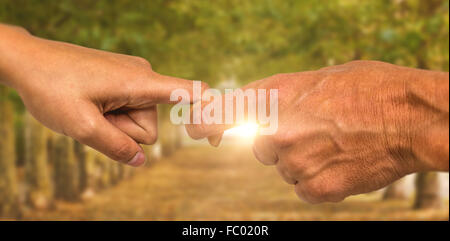 Composite image of cropped hands of people holding fingers Stock Photo