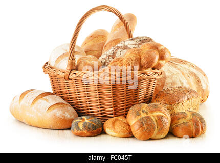 Bread and rolls in wicker basket isolated on white Stock Photo