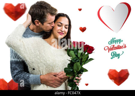 Composite image of man embracing and kissing girlfriend Stock Photo