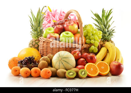 Composition with assorted fruits in wicker basket Stock Photo