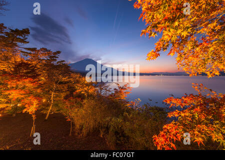 Mt. Fuji, Japan during autumn from the shore of Lake Yamanaka. Stock Photo