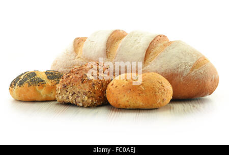 Composition with bread and rolls in wicker basket isolated on white Stock Photo