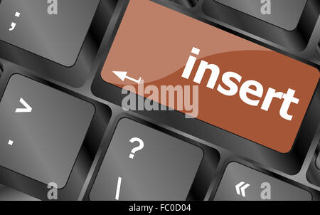 insert word on computer pc keyboard key Stock Photo