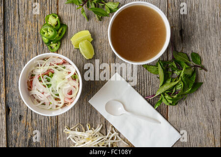 Pho Fast Food To Go on Wood Background Stock Photo