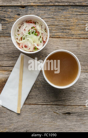 Pho Fast Food To Go on Wood Background Stock Photo