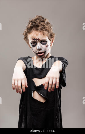 Screaming walking dead zombie child boy Stock Photo