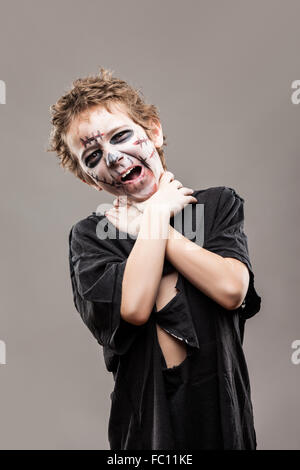 Screaming walking dead zombie child boy Stock Photo