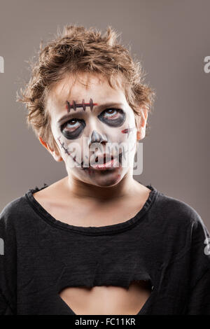 Screaming walking dead zombie child boy Stock Photo