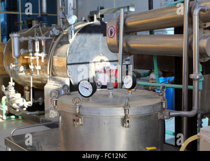 distillation of essential oils in factory Stock Photo