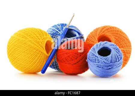 Colorful yarn for crocheting and hook isolated on white background Stock Photo