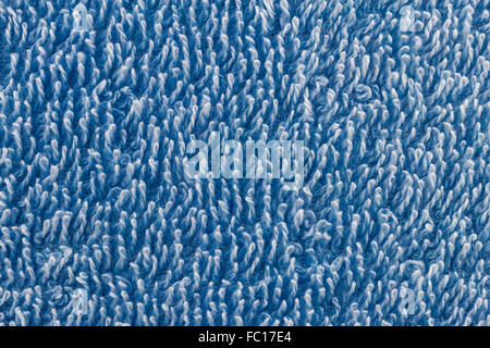 Background from closed up hairs of blue fabric Stock Photo