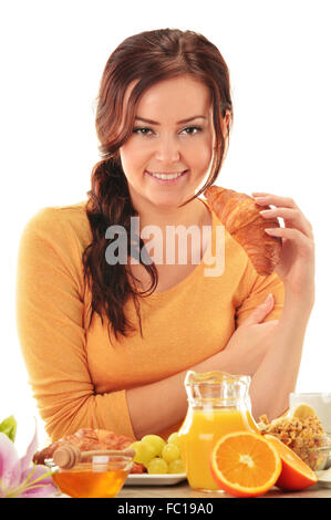 Young woman having breakfast. Balanced diet Stock Photo