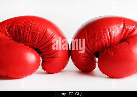 A pair of red boxing gloves. Sports concept. Stock Photo