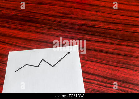 Sheet of paper with printed curve graph Stock Photo