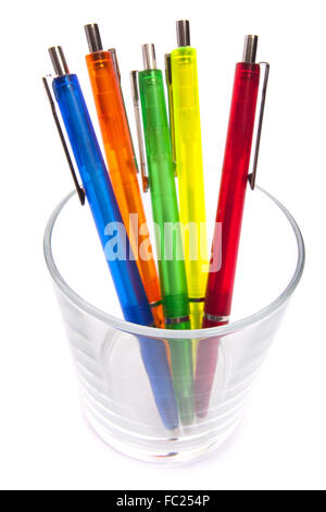 Multi-colored pens in a glass Stock Photo