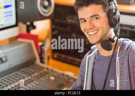 Portrait of an university student mixing audio Stock Photo