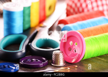 Composition with tailor accessories on wooden table Stock Photo