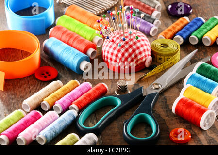 Composition with tailor accessories on wooden table Stock Photo