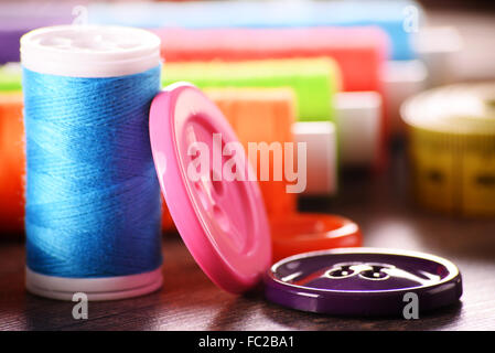 Composition with tailor accessories on wooden table Stock Photo