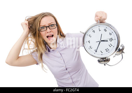 Young employee holding alarm clock isolated on white Stock Photo