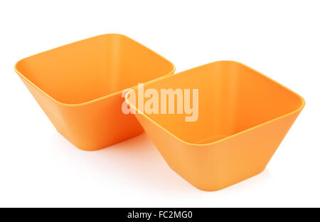 two orange bamboo bowls, isolated on white background Stock Photo