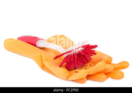 Red dish washing brush with rubber gloves Stock Photo