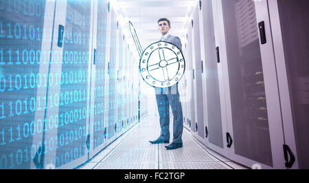 Composite image of shiny blue binary code on black background Stock Photo